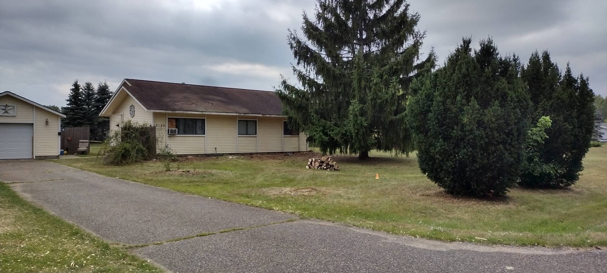 Same residential property after trees and overgrowth were removed