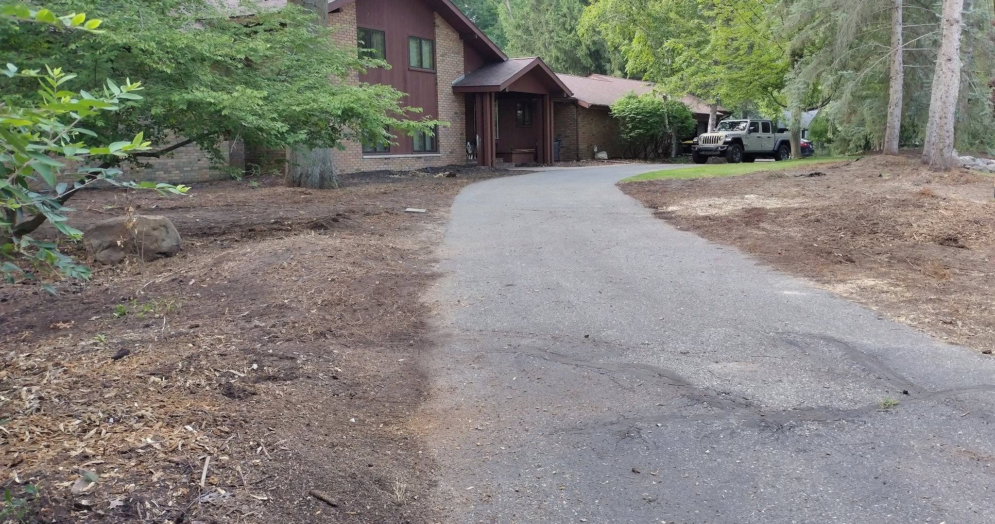 Same driveway area after the stumps were ground